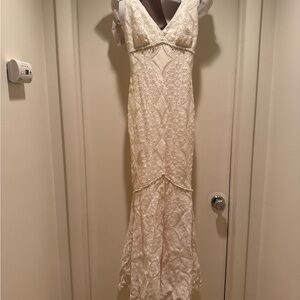 Claire Pettibone Chic Cream Lace Wedding Gown